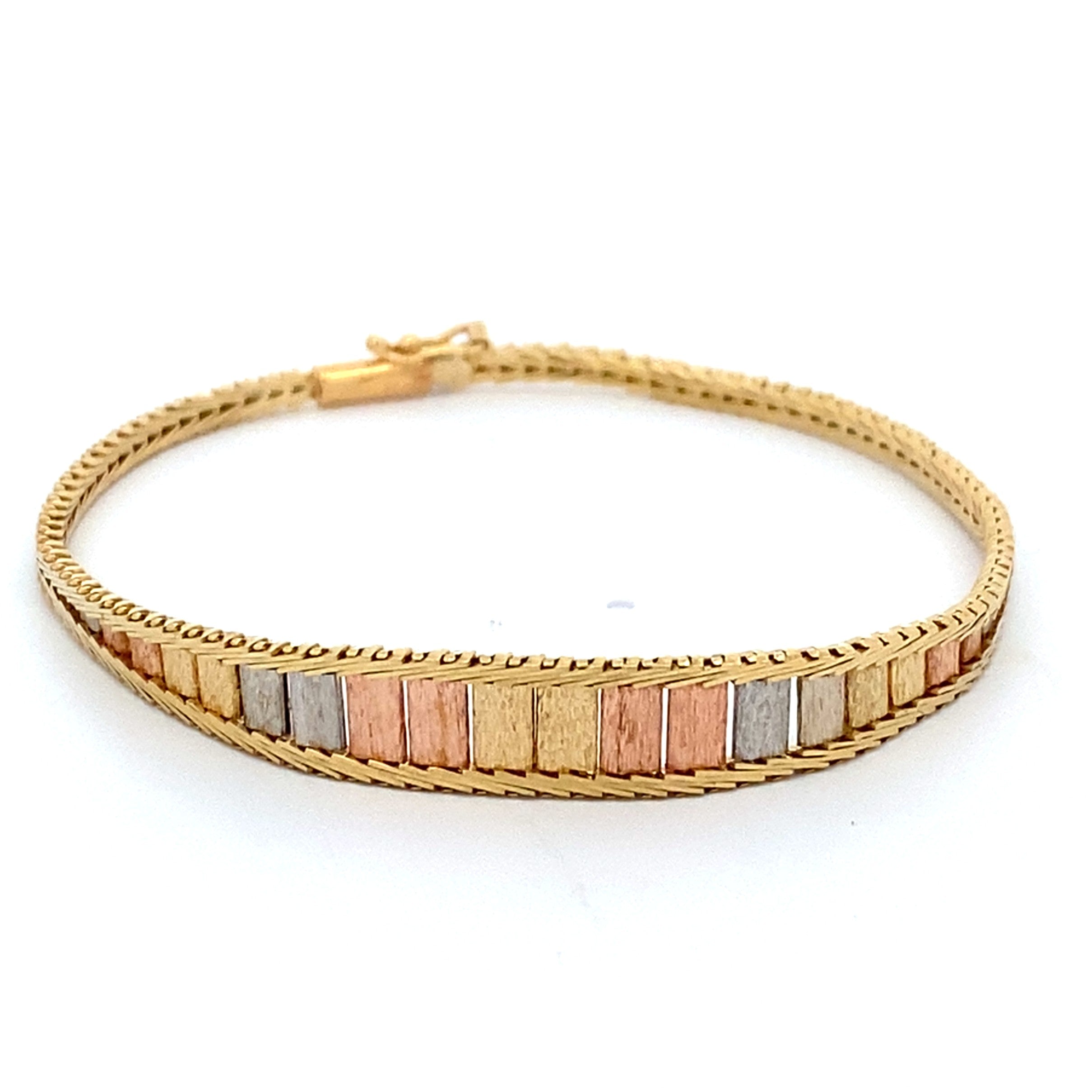 Tri-Color Bracelet 14K
7 inches


This 14-karat bracelet measures