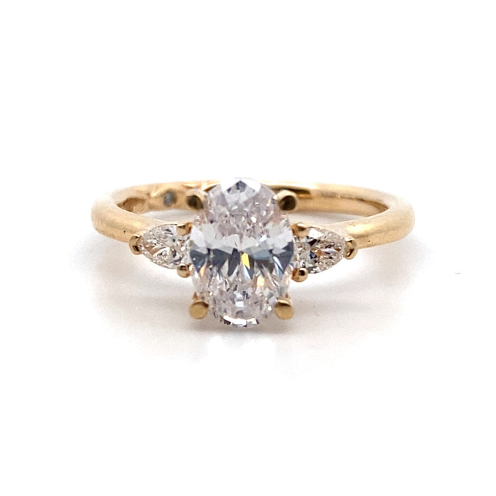 Oval Center Three Stone Engagement Ring